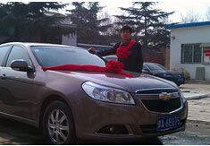 超前涂料獎勵員工轎車，真石漆生產(chǎn)廠家！